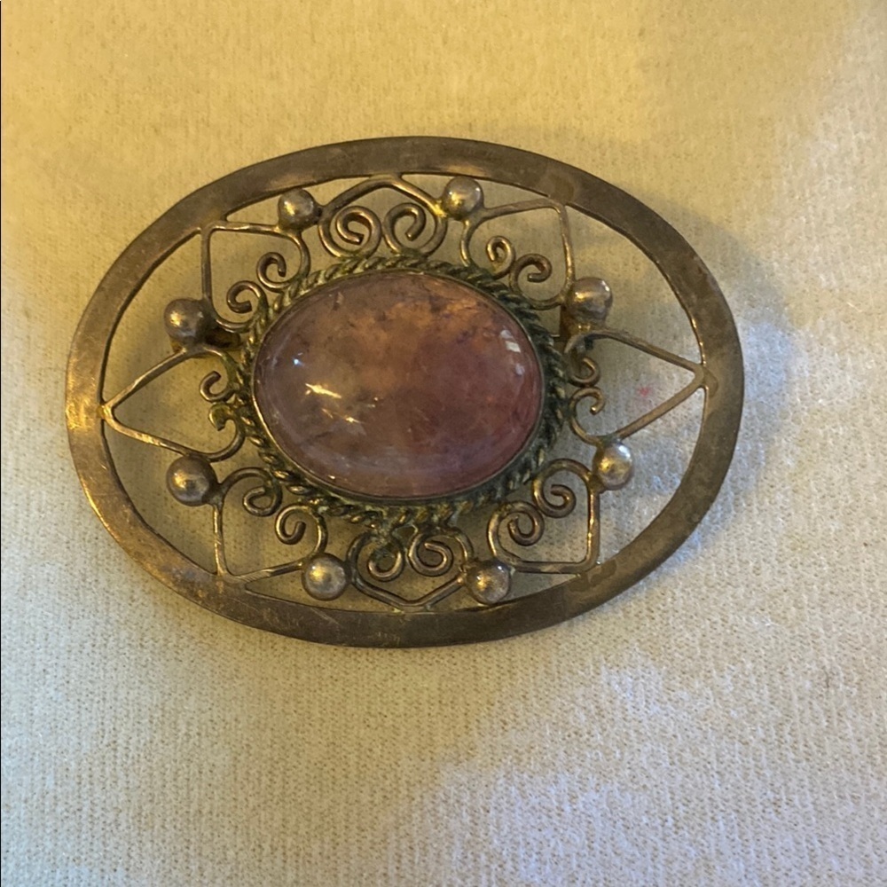 Ornate Pink and Silver Brooch with Intricate Metalwork